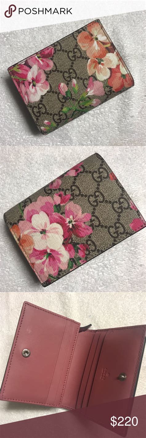 black gucci wallet flowet